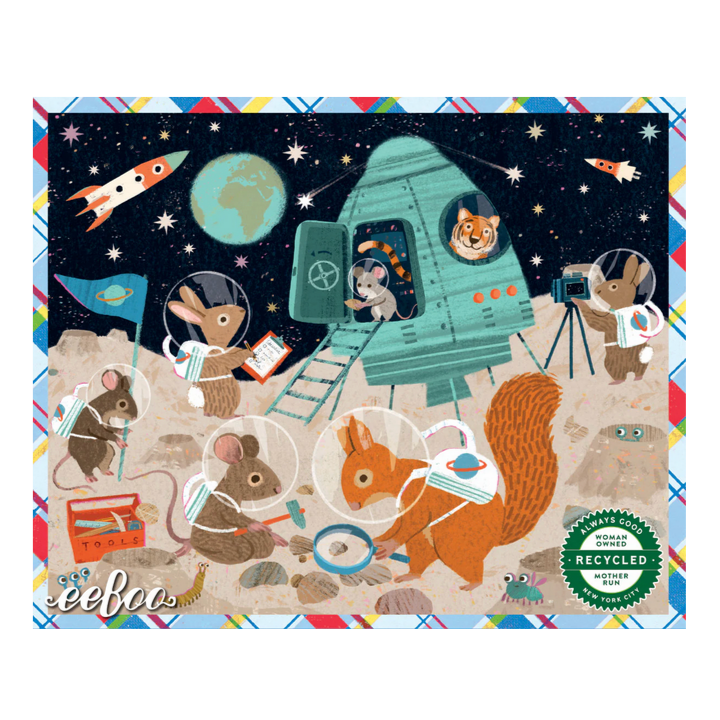 puzzle with space-themed illustration of animals in a spaceship, featuring the brand 'eeboo'.
