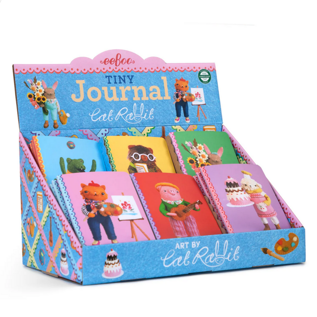 Display of children's journals with a colorful packaging 