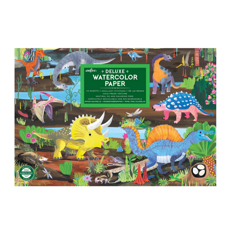 Packaging of watercolor paper with dinosaur illustrations on a white background