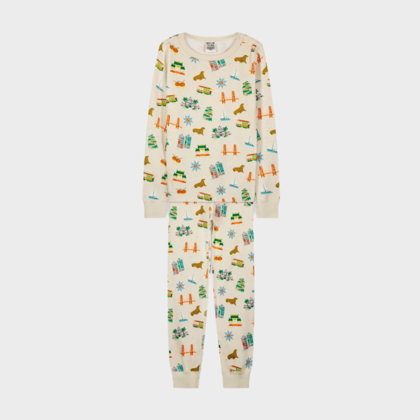 Children's onesie with vehicle pattern on a white background
