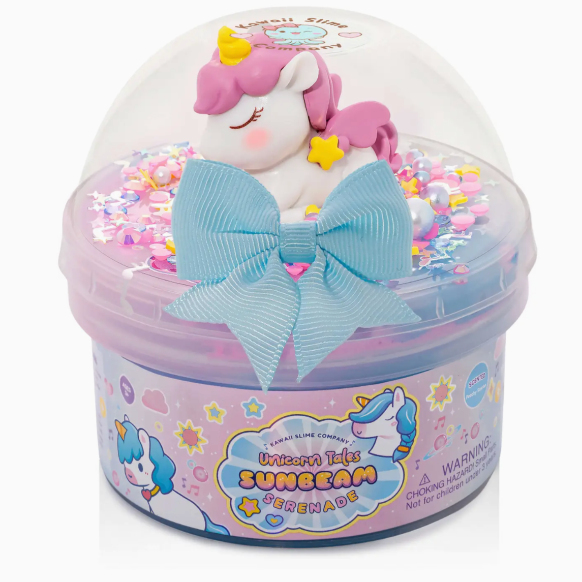 Unicorn-themed toy in a clear container with colorful decorations on a white background
