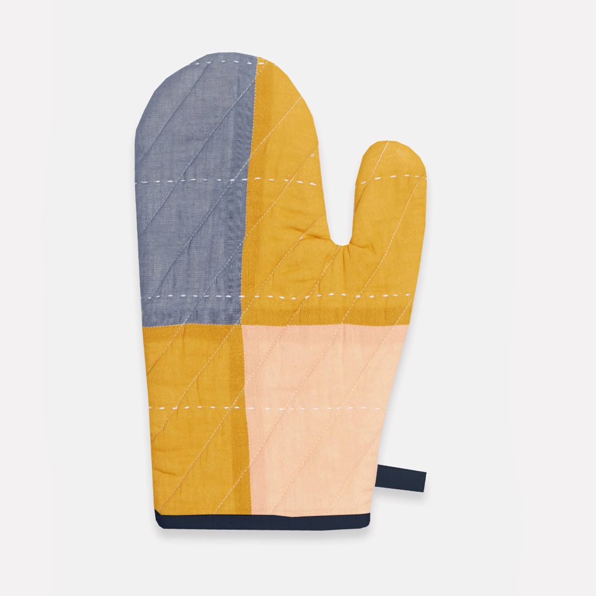 Color-blocked oven mitt on a white background with a video call interface overlay.