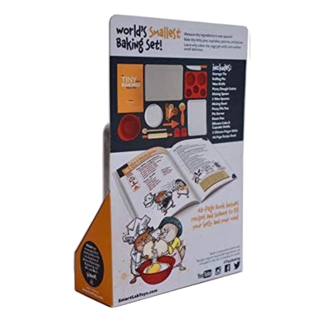 Box packaging of a baking set with cartoon illustrations on a white background