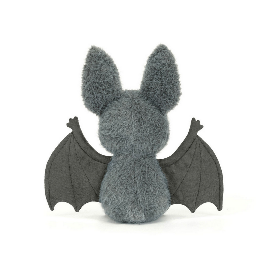 Plush toy bat with price tag on a white background