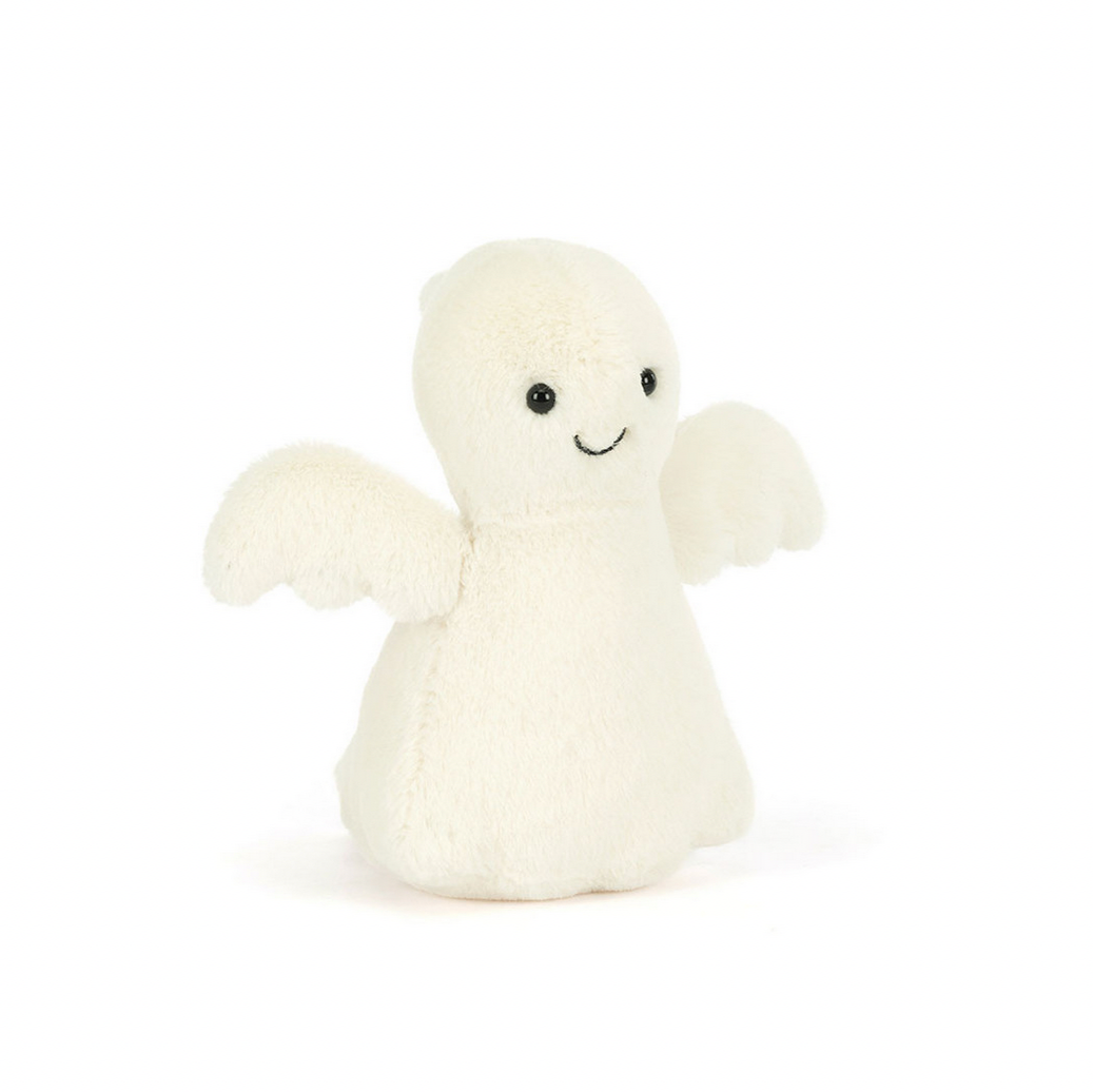 White ghost plush toy on a white background