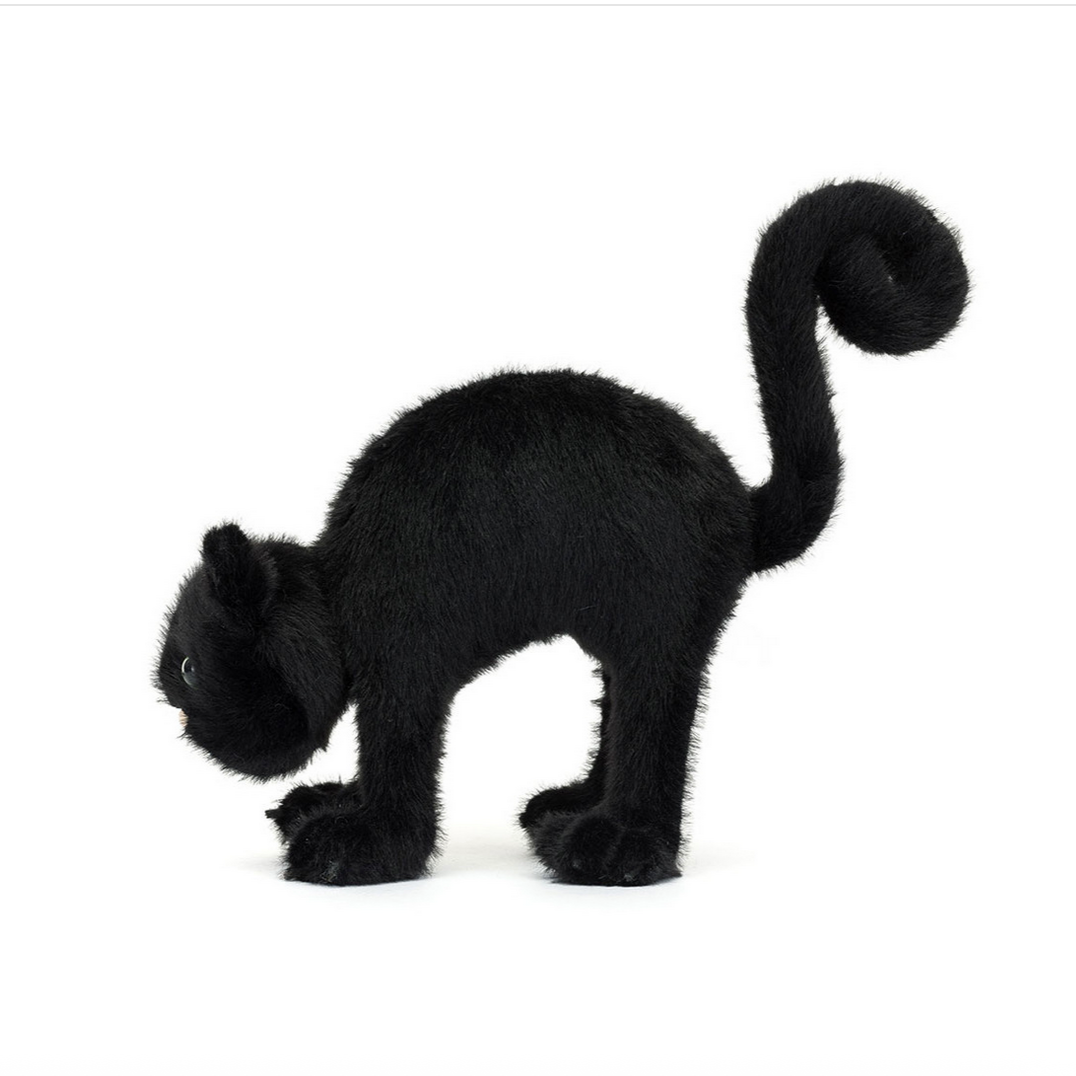 Black cat toy on a white background