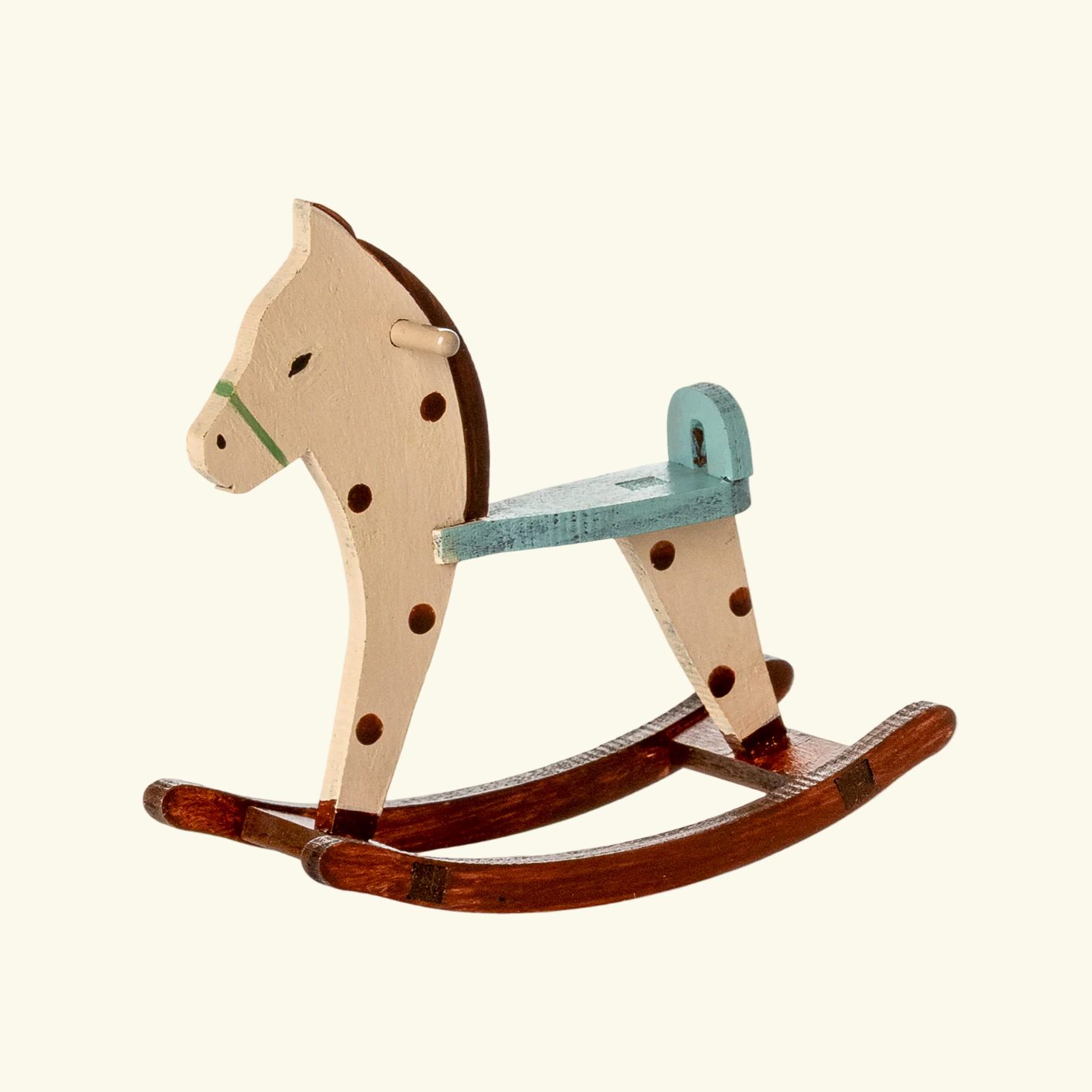 Wooden rocking horse.