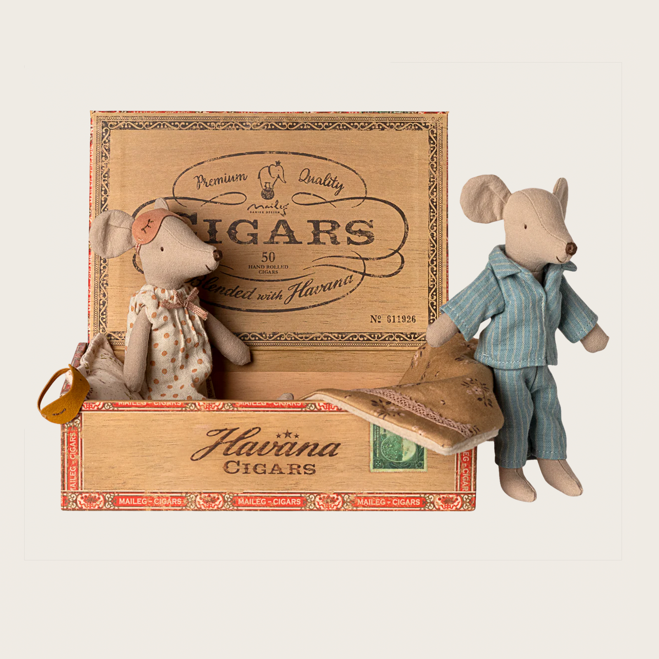 Two toy mice in a cigar box 