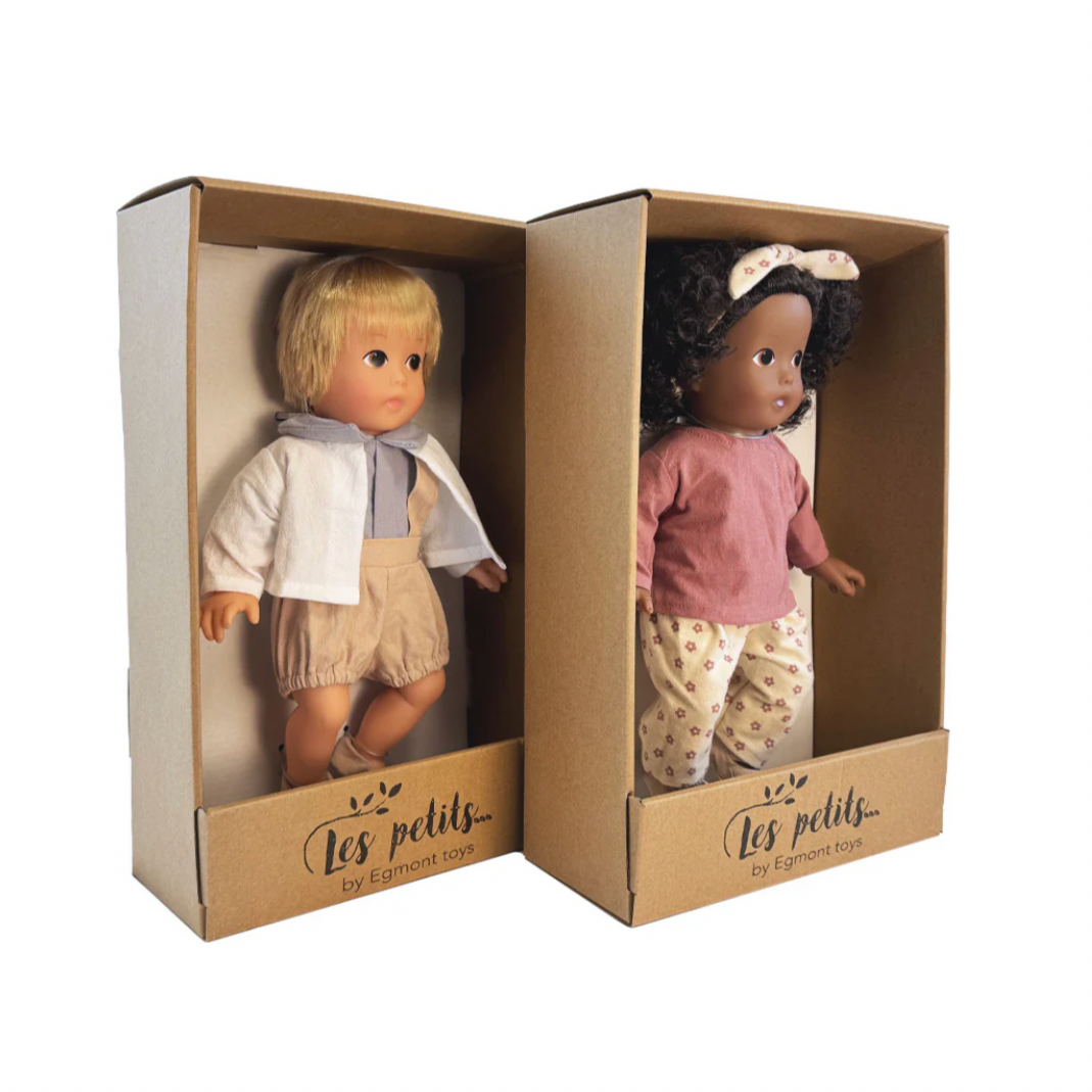 Two dolls in packaging with 'Les Petits'.