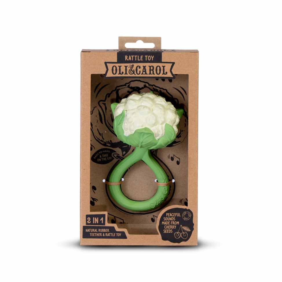 Oli & Carol rattling toy in packaging on a white background