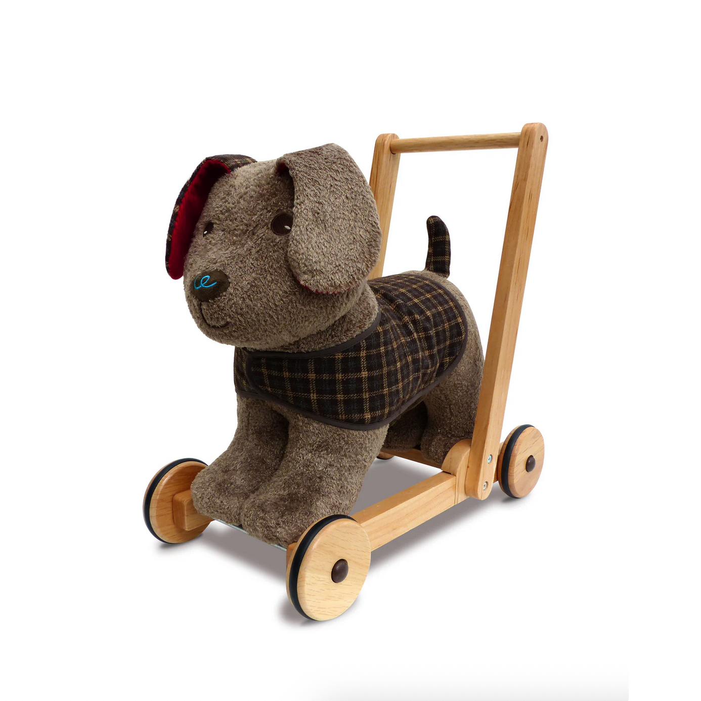 Toy dog with a wooden push along frame on a white background