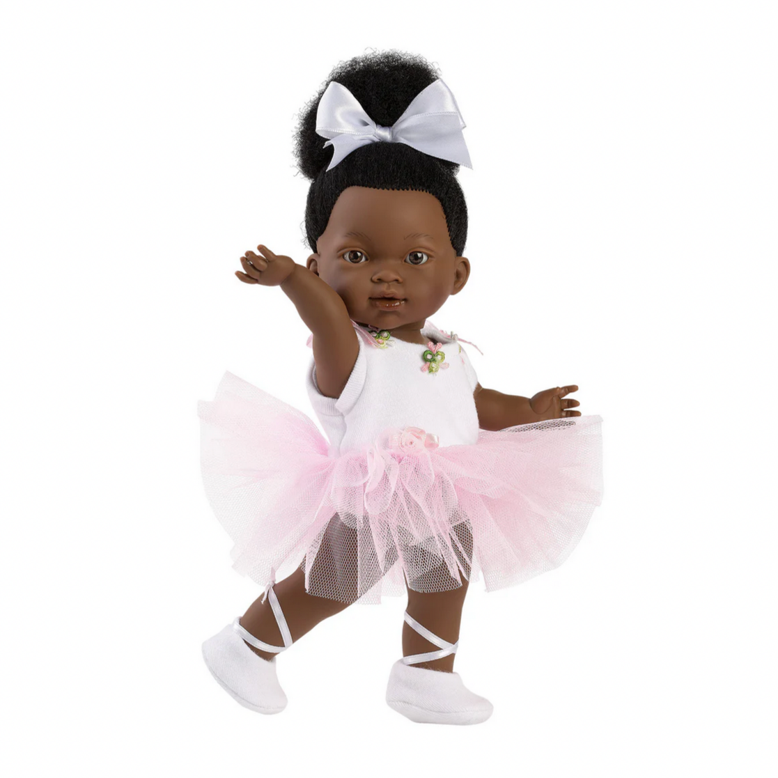Doll in a ballet outfit with a white background