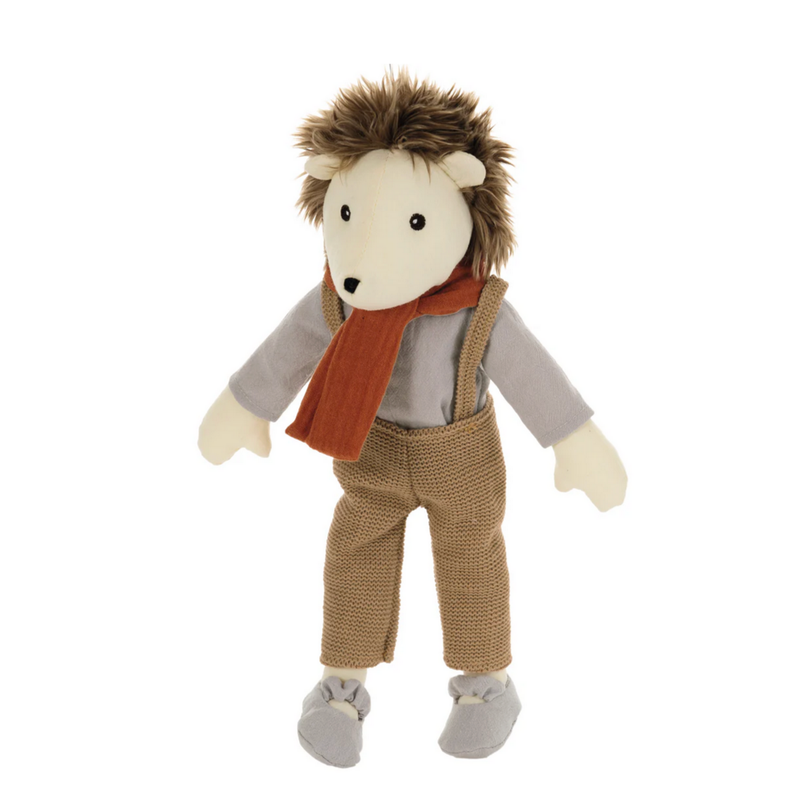 Stuffed toy lion wearing a vest, shirt, and pants on a white background