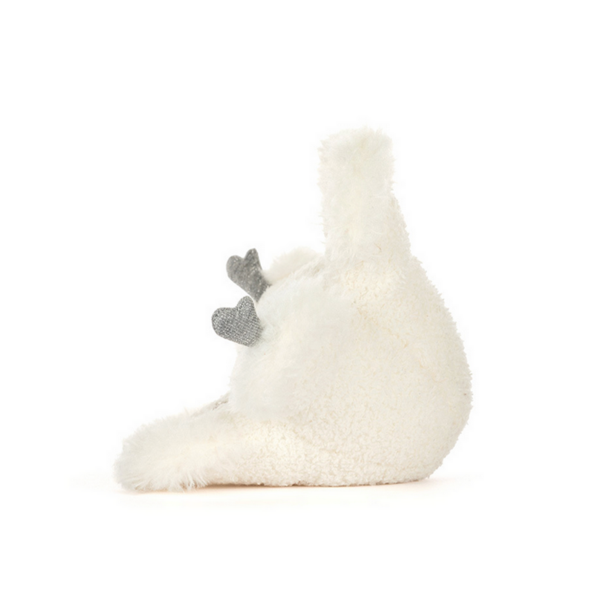 White plush swan with a small gray duckling on a white background