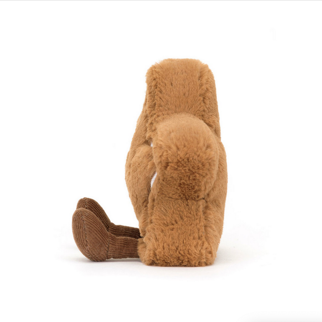 Brown plush toy on a white background