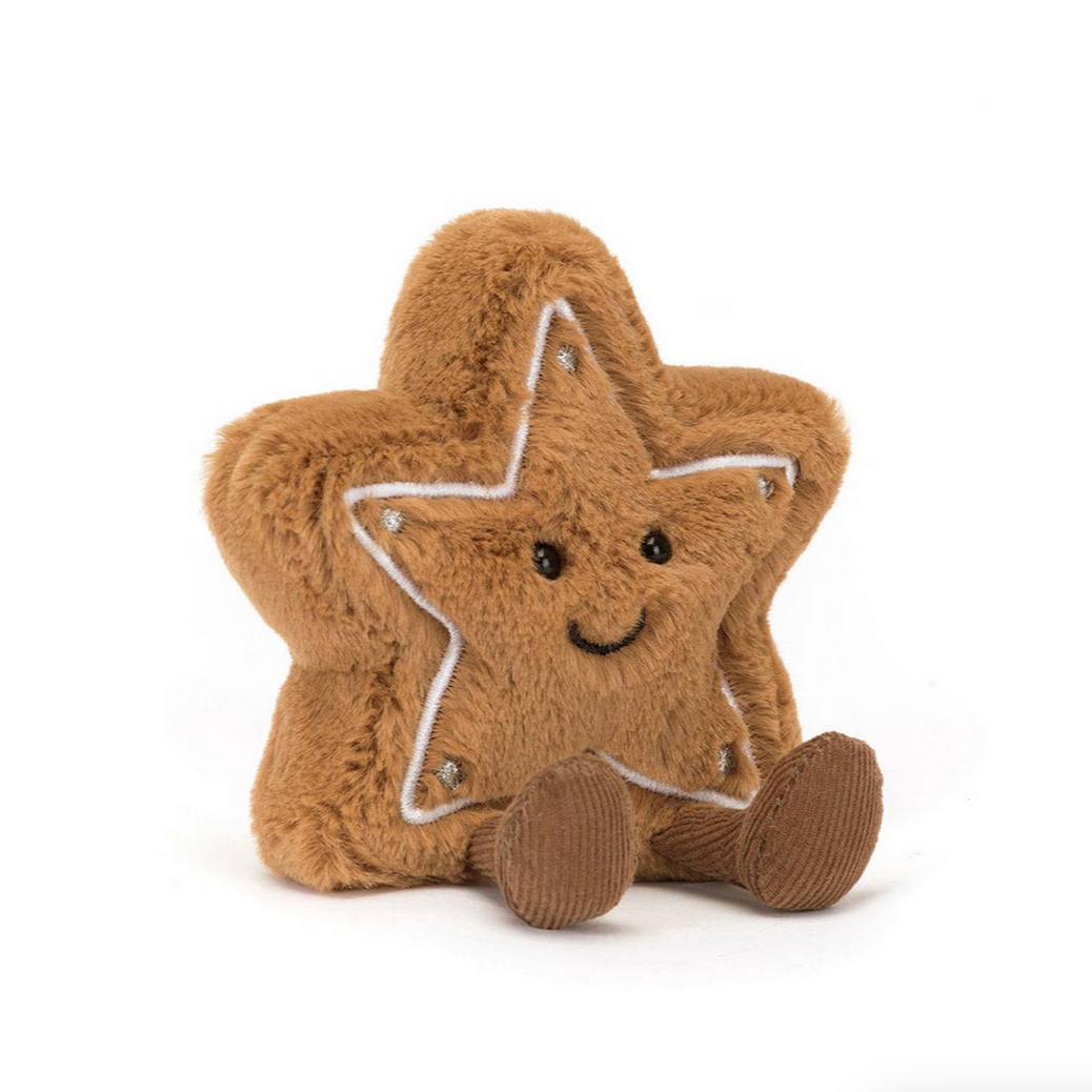Star-shaped plush toy with a smiling face on a white background