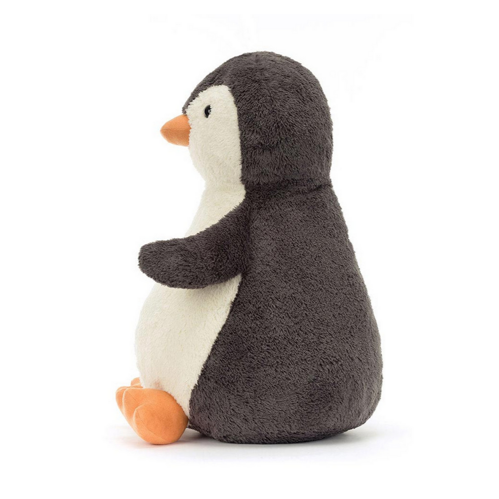 Stuffed penguin toy on a white background