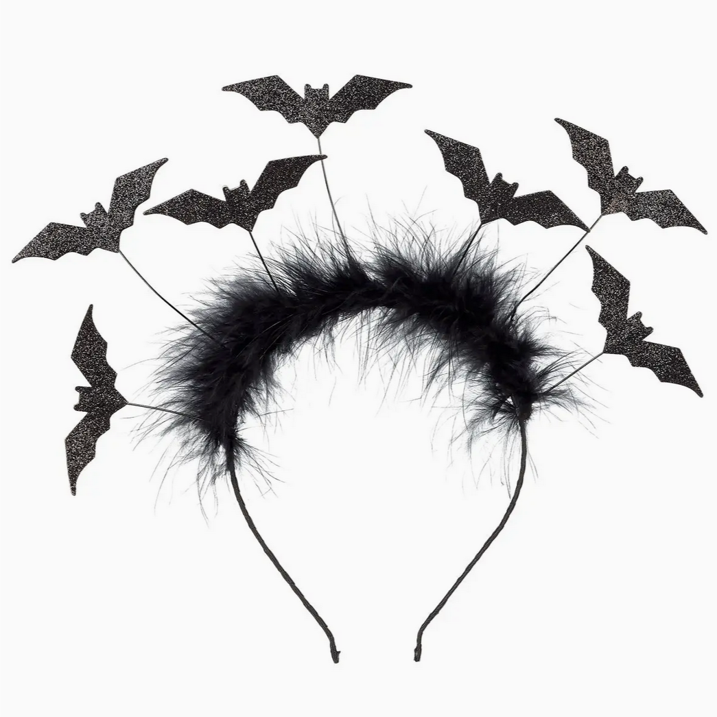 Black bat headband with fluffy center on a white background