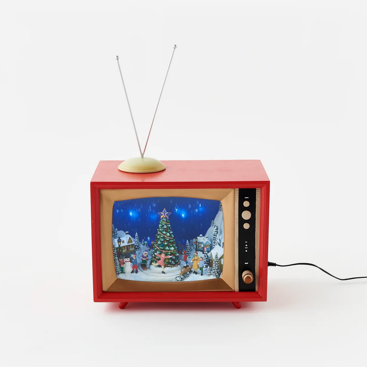 Vintage-style red television with a Christmas scene on a white background