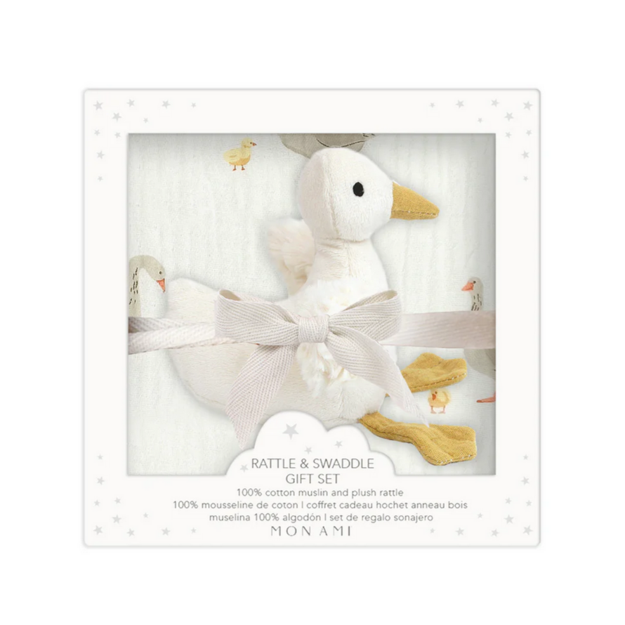 Baby rattle and swaddle set with duck design in packaging on a white background