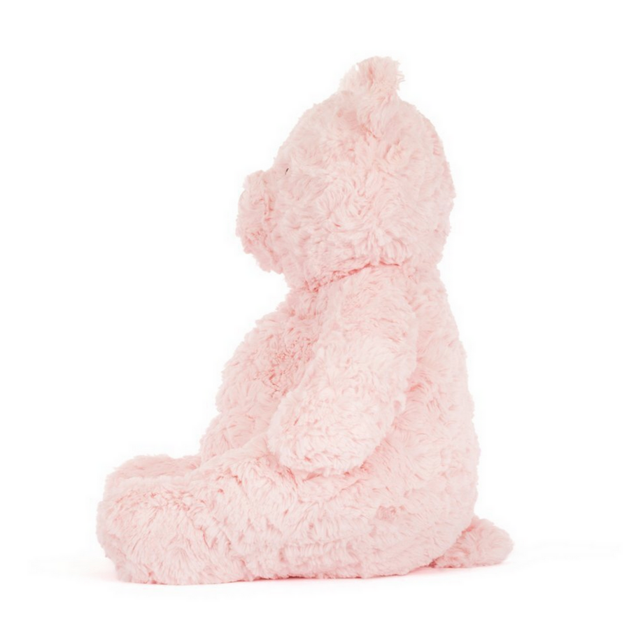 Pink plush toy on a white background