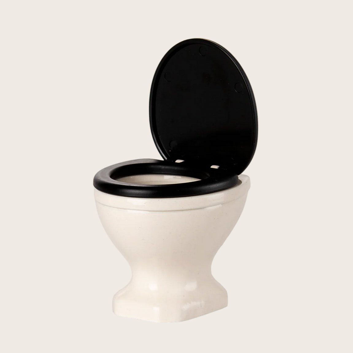 White RC model of a toilet with black seat on a computer screen