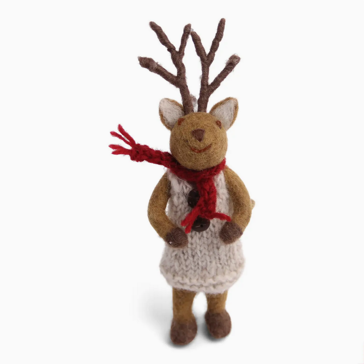 Knitted reindeer toy with a red scarf on a white background