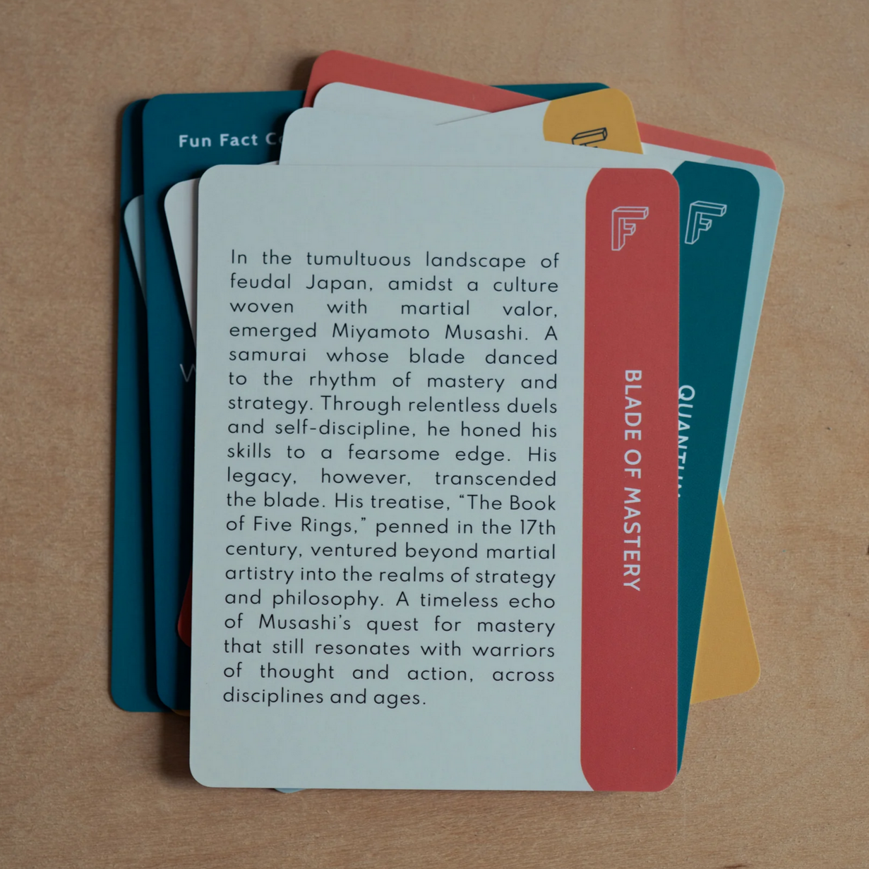 Educational cards with text on a wooden surface