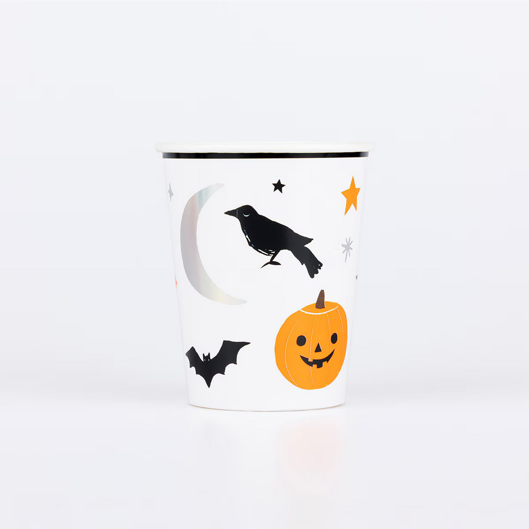Ceramic mug with Halloween-themed design on a white background