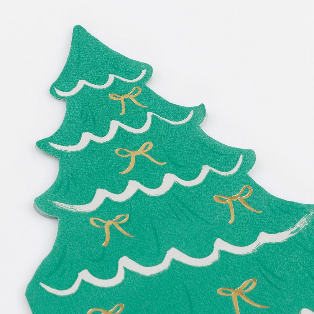 Green shirt shaped like a Christmas tree with gold bows on a white background
