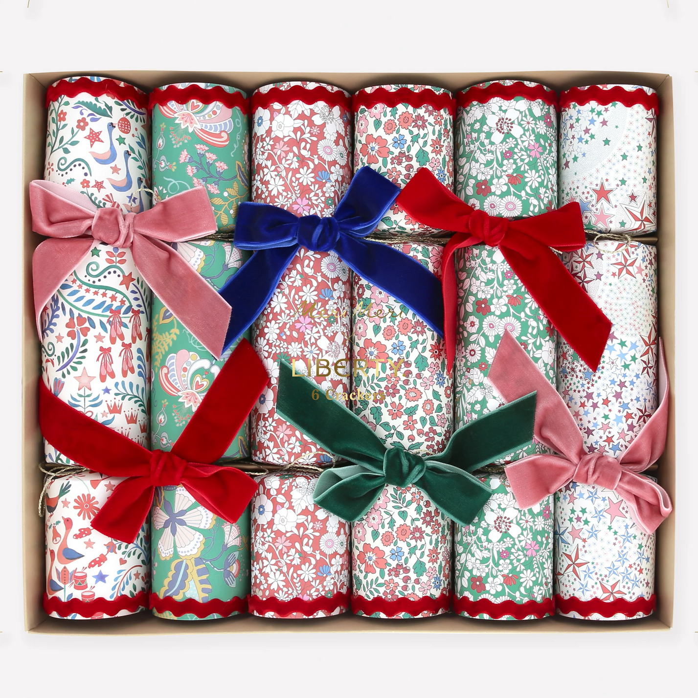 Decorative crackers with colorful bows in a box
