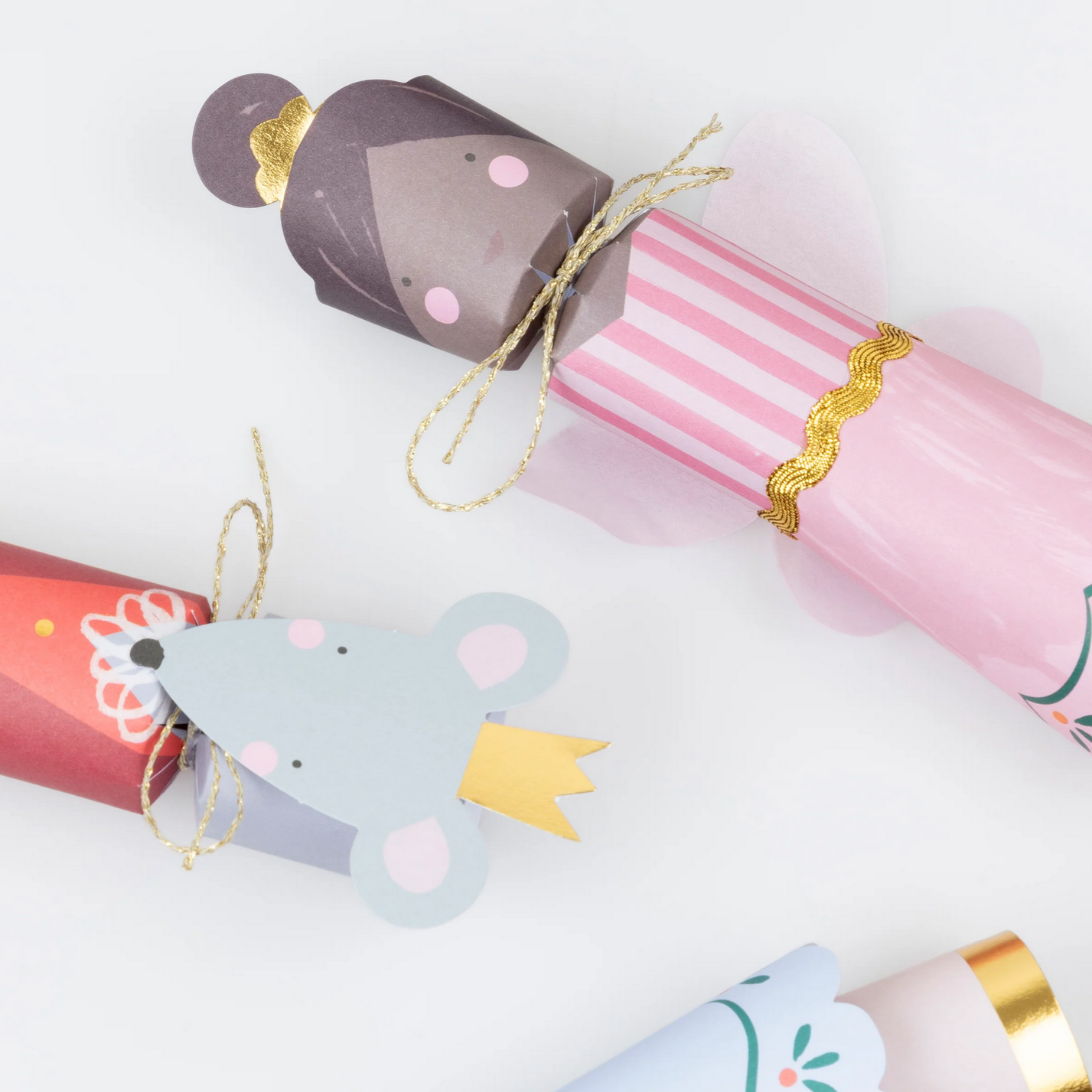 Decorative paper rolls with animal designs on a white background
