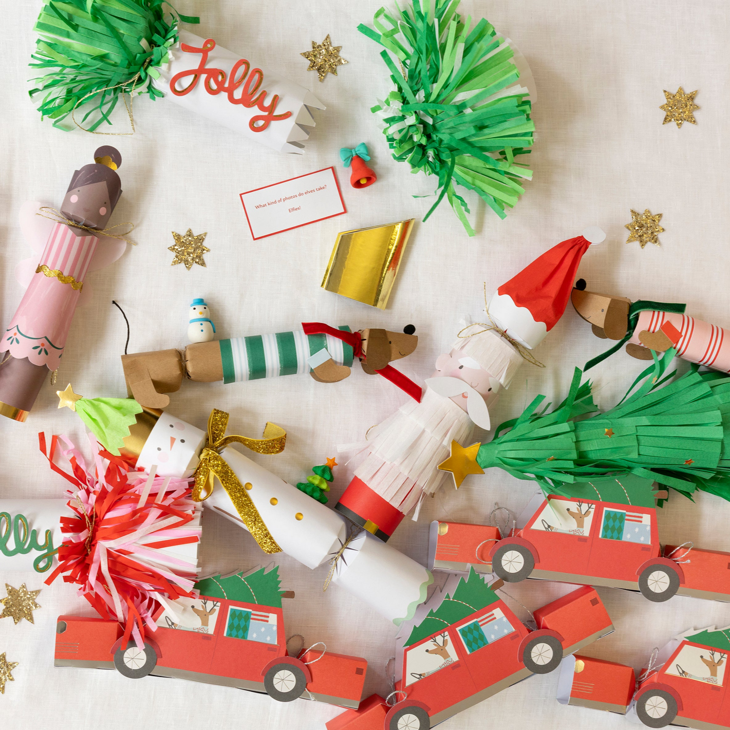 Collection of Christmas-themed paper crafts on a white background