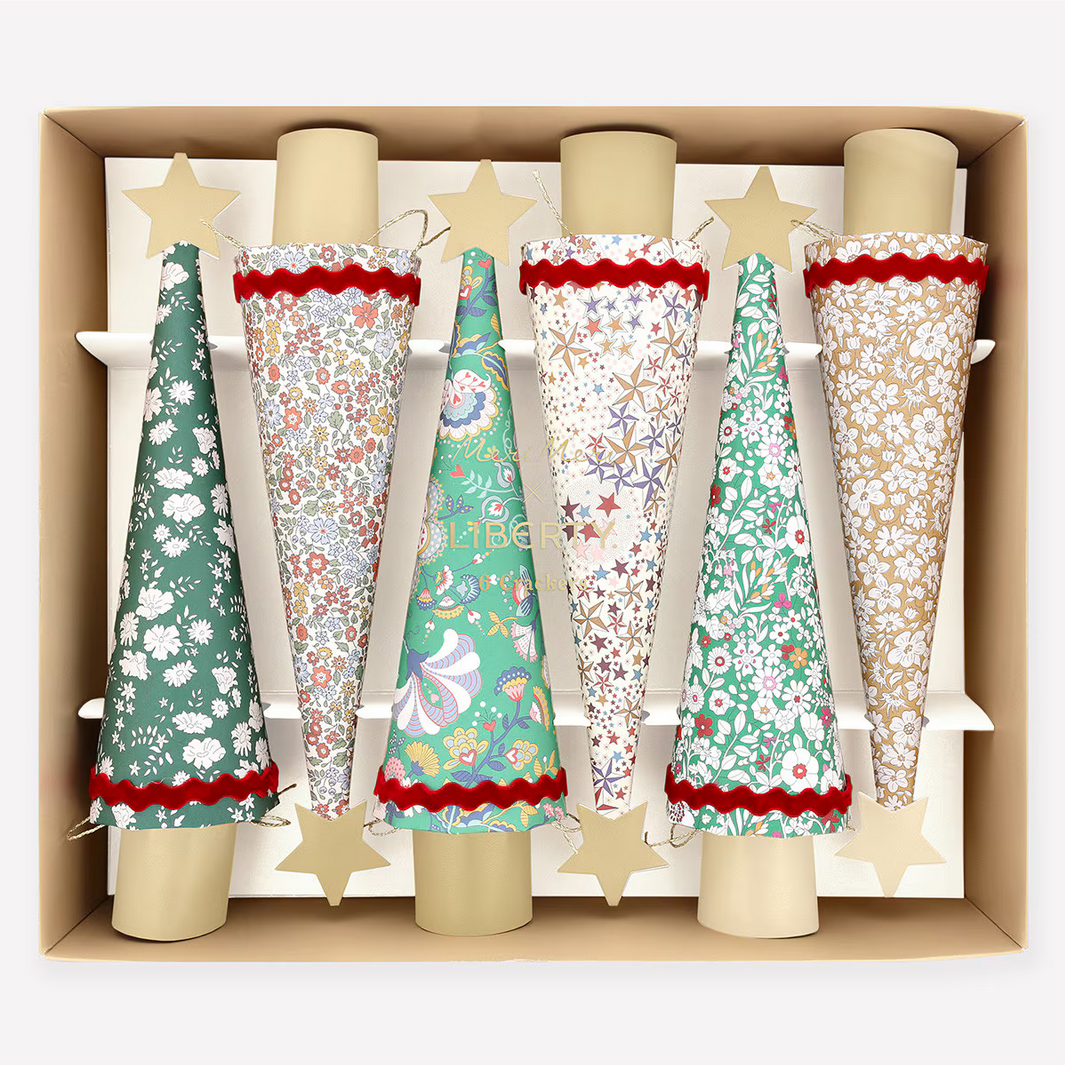 Set of decorative paper trees with floral patterns in a box