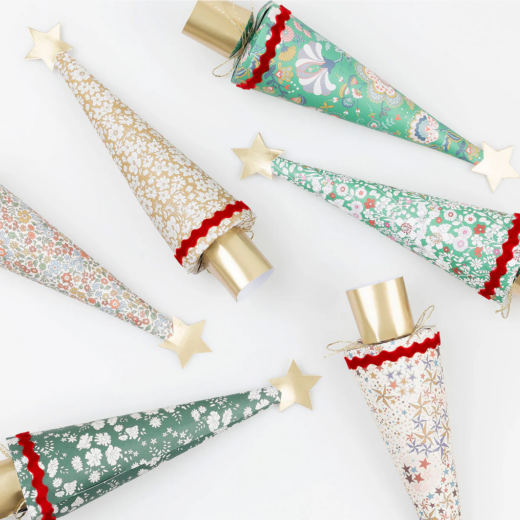 Decorative paper cones with festive patterns on a white background