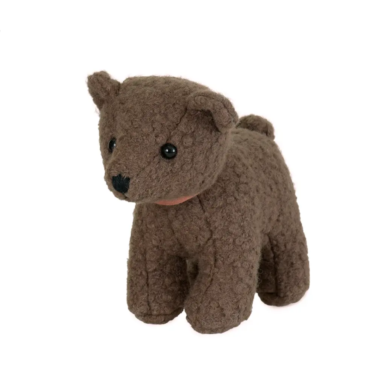 Brown plush dog toy on a white background
