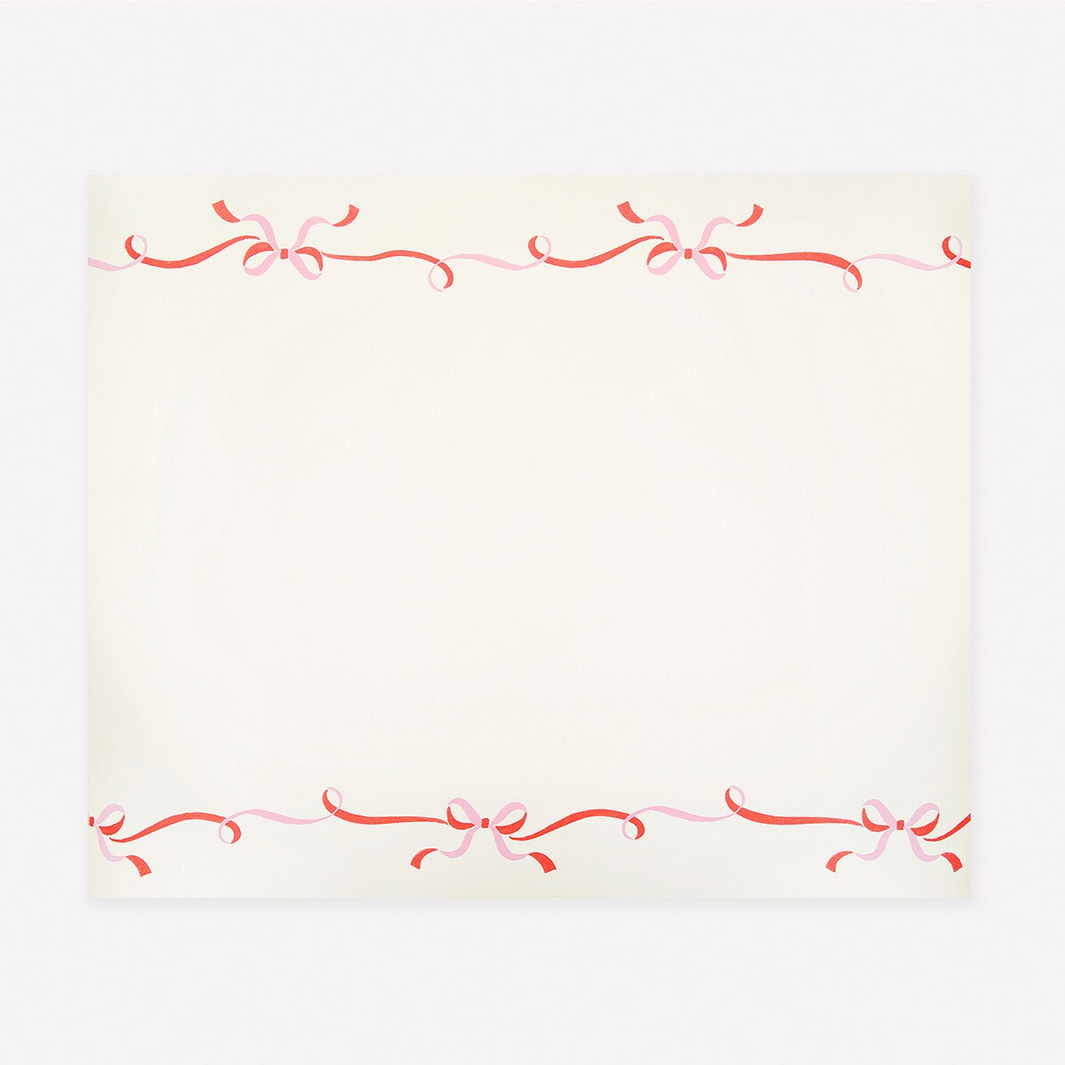 Table runner with a Decorative red border on a white background