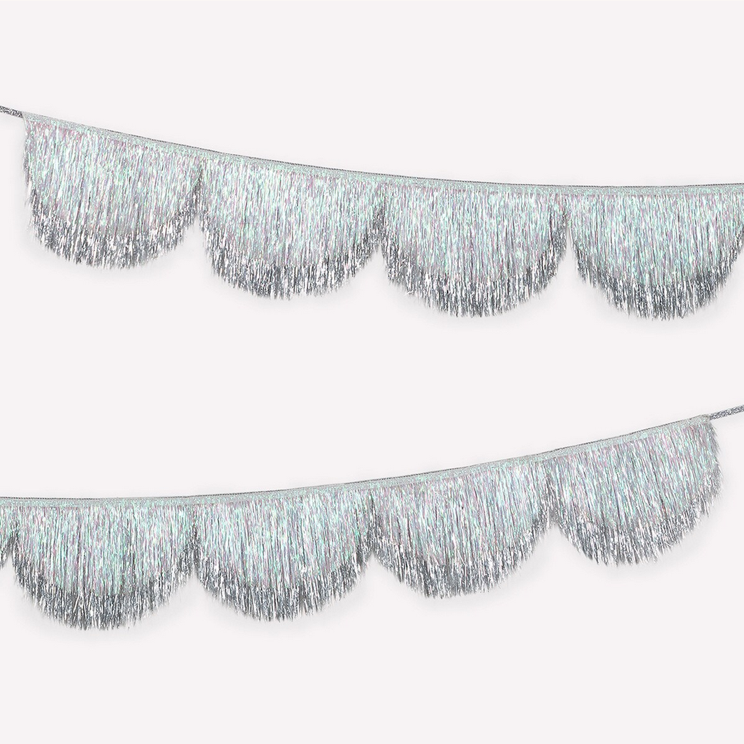 Silver tinsel fringe garland on a white background