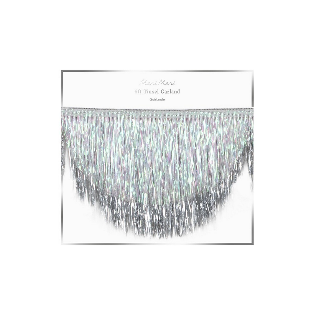Silver tinsel garland on a white background with 'Merry & Bright' branding.