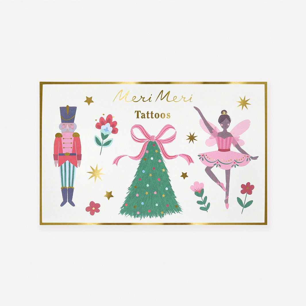 Meri Meri tattoos packaging with Christmas-themed illustrations on a white background