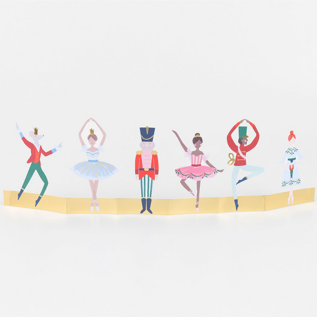 Illustrations of a Nutcracker scene with characters on a white background