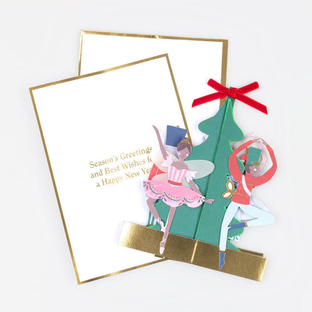 Greeting card with Christmas tree and fairy design on a white background