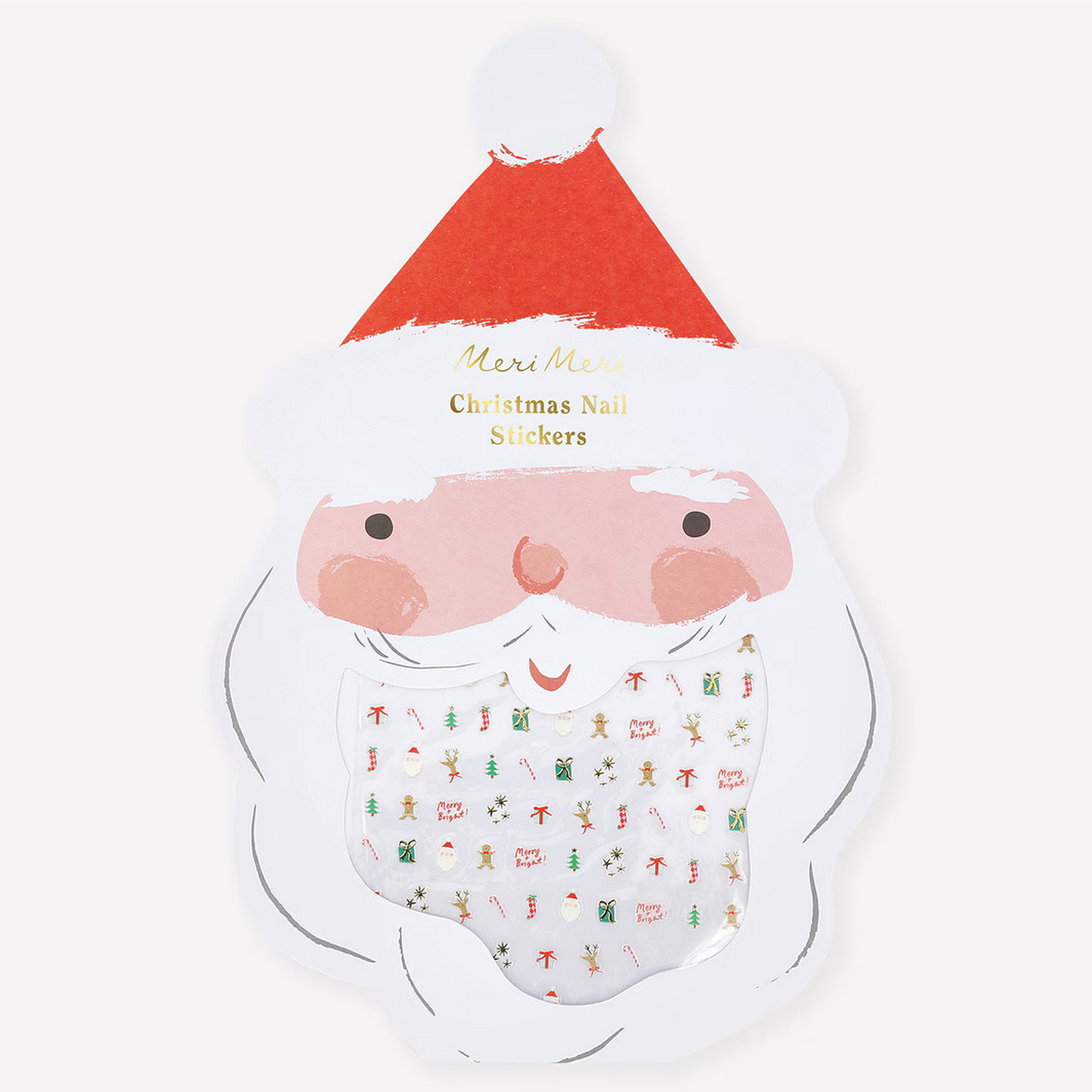 Santa Claus design with Christmas-themed nail stickers on a white background