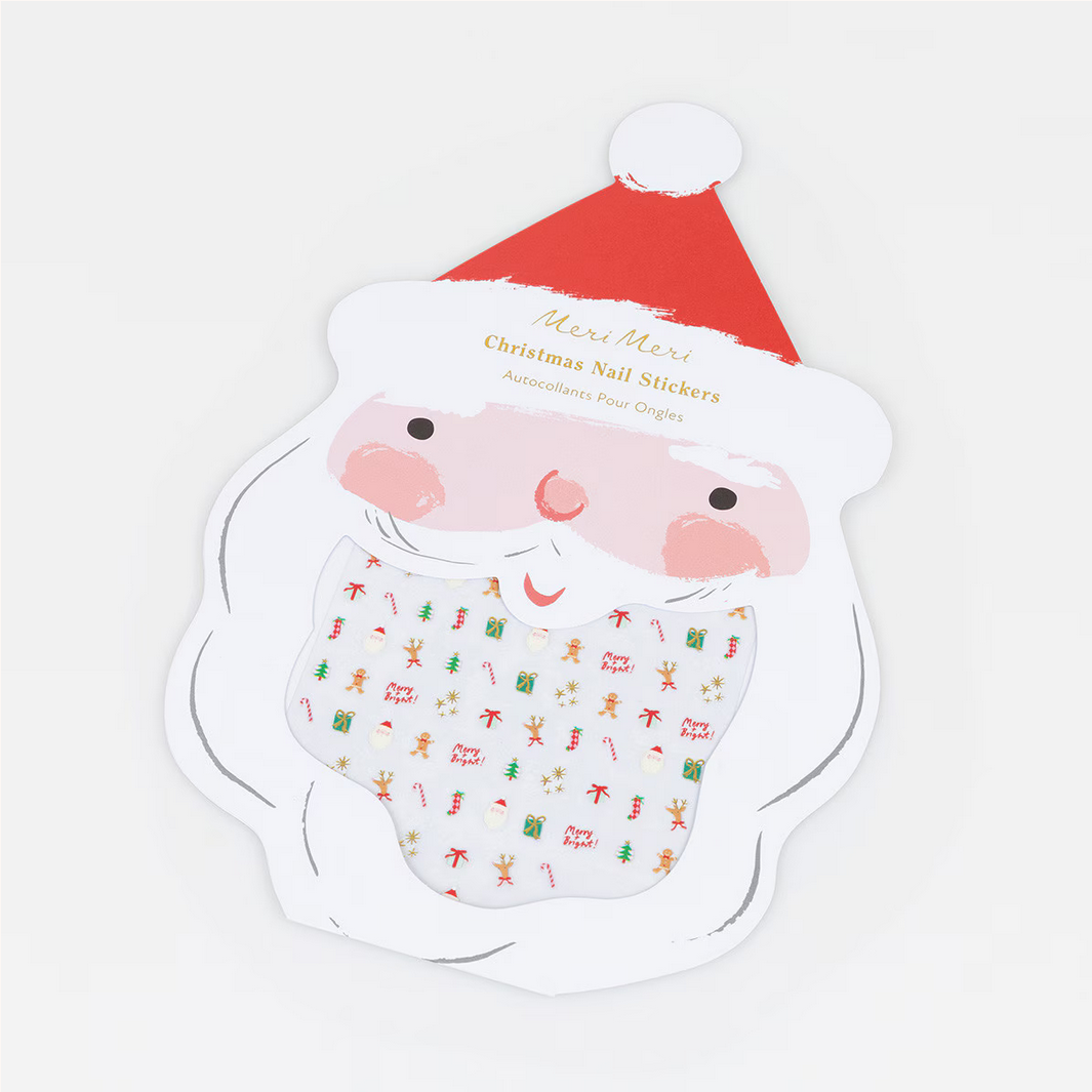 Santa Claus-shaped nail sticker with a red hat on a white background