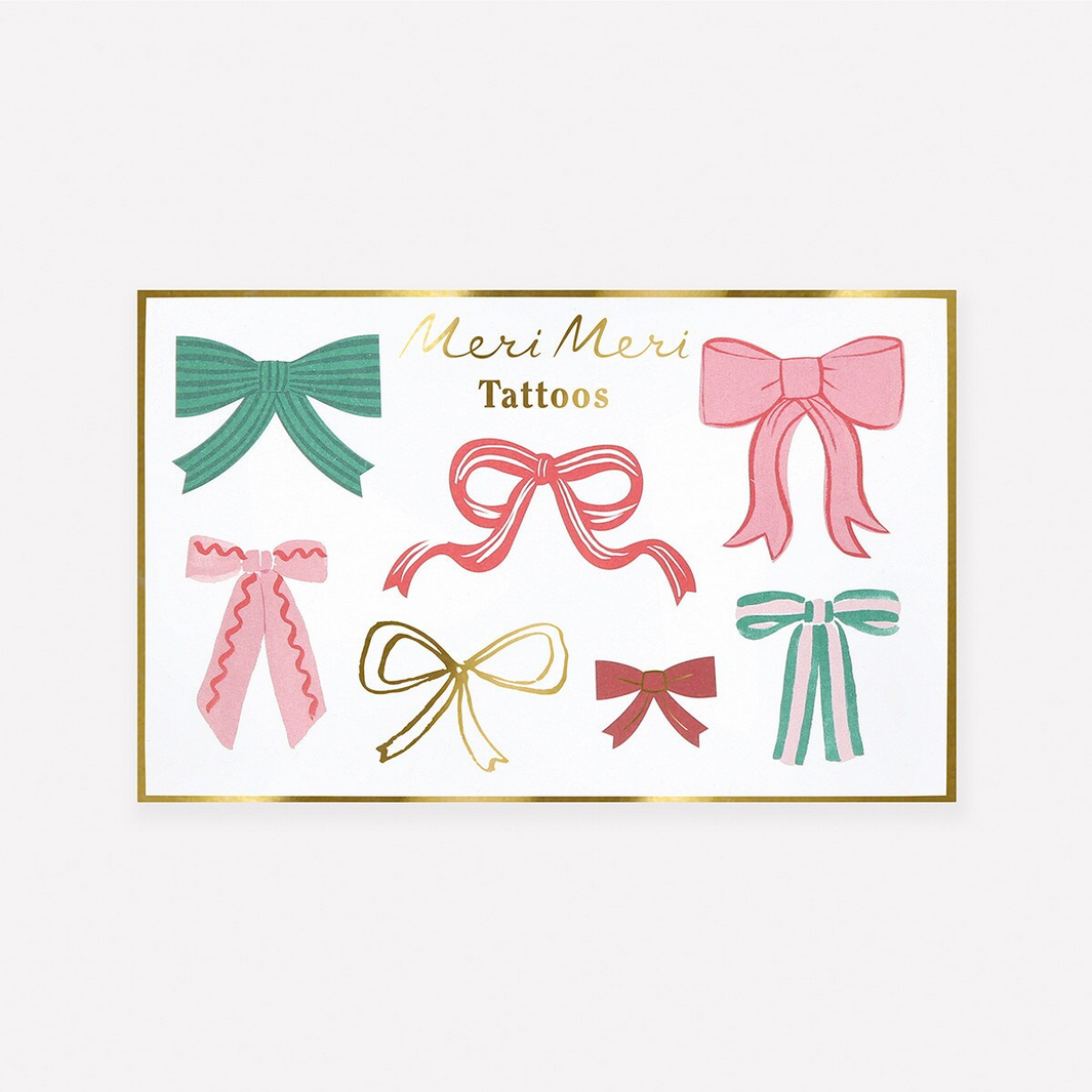 Sheet of bow-shaped tattoos by Meri Meri on a white background