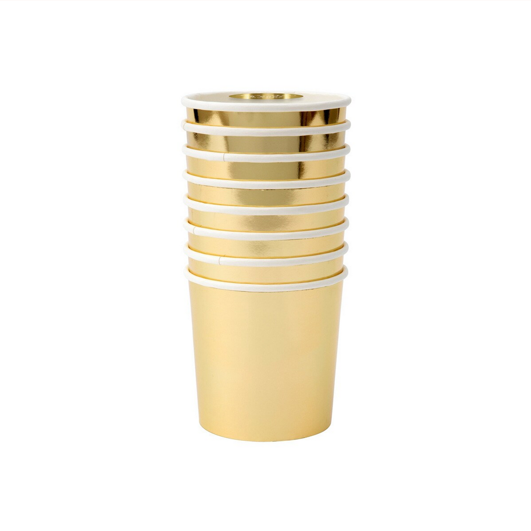 Stack of gold and white paper cups on a white background