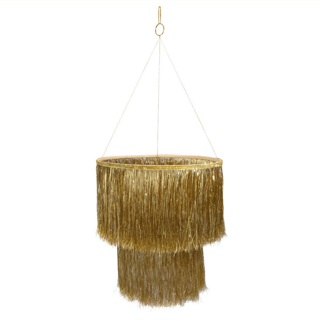 Gold fringe lampshade hanging against a white background