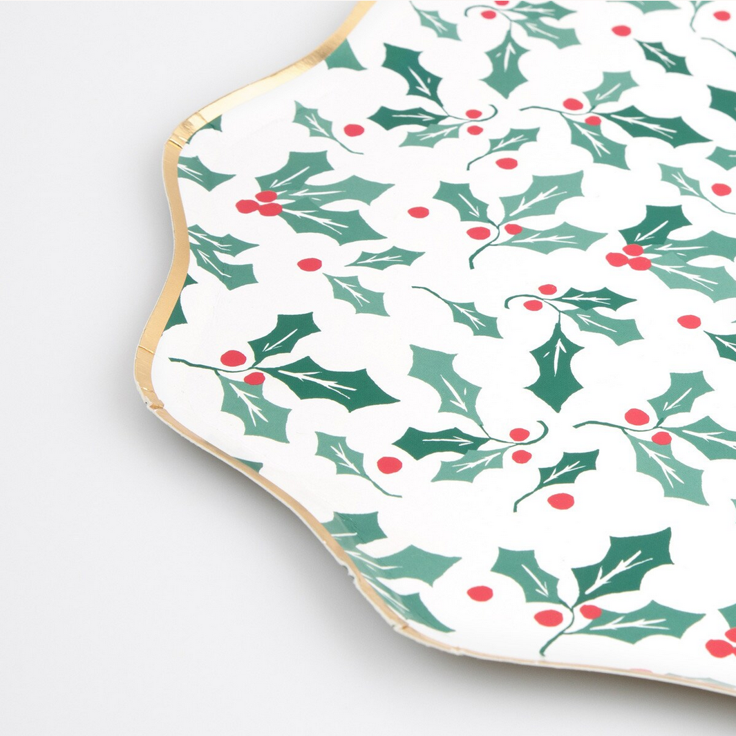 Hexagonal coaster with holly leaf and berry pattern on a white background