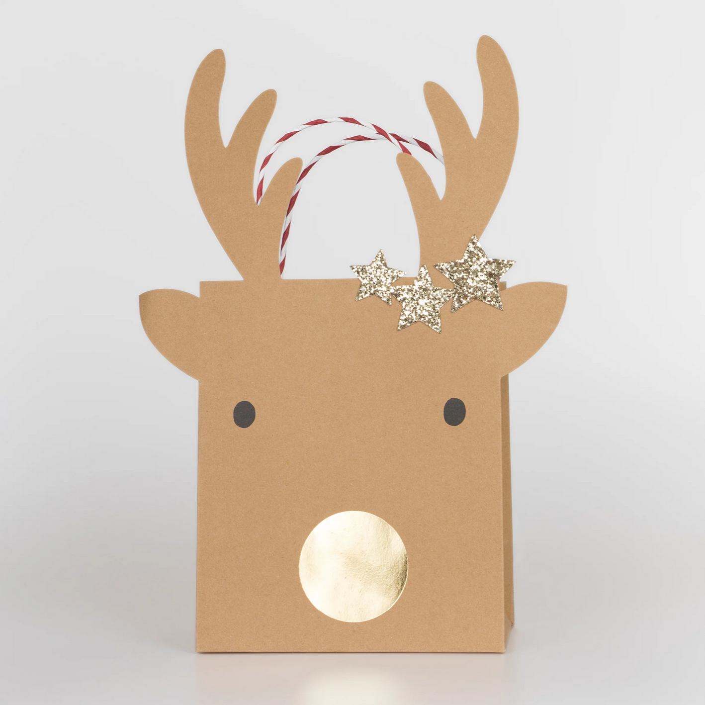 Cardboard reindeer decoration with antlers and decorative string on a white background