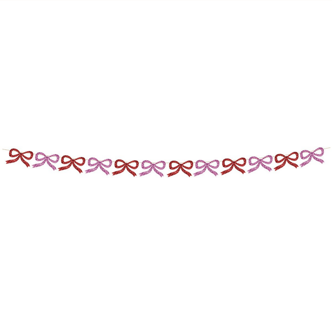 Decorative border of red and pink bows on a white background
